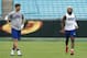 New York Giants' Eli Manning, left, and Odell Beckham, right, warm up before an NFL football game against the Carolina Panthers in Charlotte, N.C., Sunday, Oct. 7, 2018. (AP Photo/Jason E. Miczek)