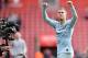 A television broadcast camera films as Chelsea's Belgian midfielder Eden Hazard applauds the fans following the English Premier League football match between Southampton and Chelsea at St Mary's Stadium in Southampton, southern England on October 7, 2018. - Chelsea won the match 3-0. (Photo by Glyn KIRK / AFP) / RESTRICTED TO EDITORIAL USE. No use with unauthorized audio, video, data, fixture lists, club/league logos or 'live' services. Online in-match use limited to 120 images. An additional 40 images may be used in extra time. No video emulation. Social media in-match use limited to 120 images. An additional 40 images may be used in extra time. No use in betting publications, games or single club/league/player publications. / (Photo credit should read GLYN KIRK/AFP/Getty Images)