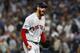 NEW YORK, NEW YORK - OCTOBER 09: Rick Porcello #22 of the Boston Red Sox reacts after closing out the fifth inning against the New York Yankees in Game Four of the American League Division Series at Yankee Stadium on October 09, 2018 in the Bronx borough of New York City. (Photo by Mike Stobe/Getty Images)
