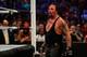 NEW YORK, NY - AUGUST 23: The Undertaker recovers during his fight against Brock Lesner at the WWE SummerSlam 2015 at Barclays Center of Brooklyn on August 23, 2015 in New York City. (Photo by JP Yim/Getty Images)