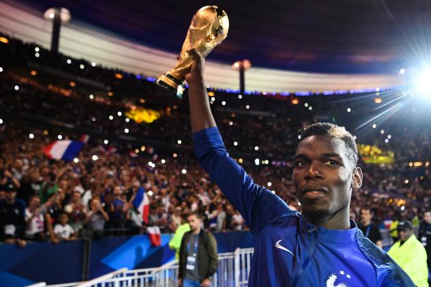 France's midfielder Paul Pogba holds the 2018 World Cup trophy as he celebrates with teammates during a ceremony for the victory of the 2018 World Cup at the end of the UEFA Nations League football match between France and Netherlands at the Stade de France stadium, in Saint-Denis, northern of Paris, on September 9, 2018. (Photo by FRANCK FIFE / AFP)        (Photo credit should read FRANCK FIFE/AFP/Getty Images)