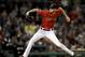 Boston Red Sox starting pitcher Chris Sale throws to a New York Yankees batter during the first inning of Game 1 of a baseball American League Division Series on Friday, Oct. 5, 2018, in Boston. (AP Photo/Charles Krupa)