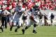 RALEIGH, NC - SEPTEMBER 29: Bryce Perkins #3 of the Virginia Cavaliers runs with the ball against the North Carolina State Wolfpack at Carter-Finley Stadium on September 29, 2018 in Raleigh, North Carolina. NC State won 35-21. (Photo by Lance King/Getty Images)