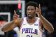 Philadelphia 76ers' Joel Embiid (21) gestures with his hands after making a shot and drawing a foul during the first half of an NBA basketball game against the Orlando Magic, Thursday, March 22, 2018, in Orlando, Fla. (AP Photo/John Raoux)