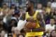 Los Angeles Lakers forward LeBron James reacts after a play against the Golden State Warriors during the first half of an NBA preseason basketball game Wednesday, Oct. 10, 2018, in Las Vegas. (AP Photo/John Locher)