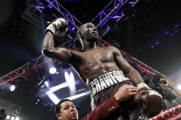 FILE - In this June 9, 2018, file photo, Terence Crawford celebrates after defeating Jeff Horn, of Australia, in a welterweight title boxing match in Las Vegas. Crawford said he’s eager to make unbeaten challenger Jose Benavidez Jr. eat his words when they meet in the ring in Omaha, Neb., on Oct. 13.  (AP Photo/John Locher, File)