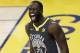 Golden State Warriors forward Draymond Green (23) celebrates after scoring against the Cleveland Cavaliers during the first half of Game 2 of basketball's NBA Finals in Oakland, Calif., Sunday, June 3, 2018. (AP Photo/Marcio Jose Sanchez)