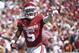 Oklahoma wide receiver Marquise Brown (5) celebrates after scoring a touchdown on a 77-yard reception against Texas during the second half of an NCAA college football game at the Cotton Bowl, Saturday, Oct. 6, 2018, in Dallas. (AP Photo/Cooper Neill)