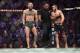 LAS VEGAS, NV - OCTOBER 06: (L-R) Conor McGregor of Ireland and Khabib Nurmagomedov of Russia exchange words after the second round in their UFC lightweight championship bout during the UFC 229 event inside T-Mobile Arena on October 6, 2018 in Las Vegas, Nevada. (Photo by Jeff Bottari/Zuffa LLC/Zuffa LLC via Getty Images)