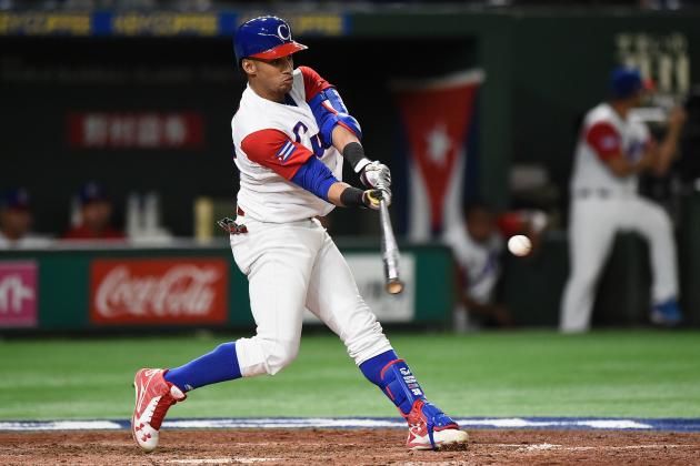 TOKYO, JAPAN - MARCH 15:  Outfielder Victor Mesa #32 of Cuba hits a RBI double to make it 13-1 in the bottom of the fifth inning during the World Baseball Classic Pool E Game Five between Netherlands and Cuba at the Tokyo Dome on March 15, 2017 in Tokyo, Japan.  (Photo by Matt Roberts/Getty Images)
