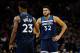 MINNEAPOLIS, MN - JANUARY 01: Karl-Anthony Towns #32 of the Minnesota Timberwolves congratulates teammate Jimmy Butler #23 on drawing a found during the game against the Los Angeles Lakers on January 1, 2018 at the Target Center in Minneapolis, Minnesota. NOTE TO USER: User expressly acknowledges and agrees that, by downloading and or using this Photograph, user is consenting to the terms and conditions of the Getty Images License Agreement. (Photo by Hannah Foslien/Getty Images)
