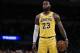 Los Angeles Lakers forward LeBron James attempts a free throw during the first half of an NBA preseason basketball game against the Sacramento Kings in Los Angeles, Thursday, Oct. 4, 2018. (AP Photo/Kelvin Kuo)