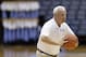 North Carolina coach Roy Williams runs a drill with players during practice following the team's NCAA college basketball media day in Chapel Hill, N.C., Tuesday, Oct. 9, 2018. (AP Photo/Gerry Broome)
