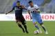 ROME, ITALY - SEPTEMBER 23: Romulo Souza of Genoa CFC compete for the ball with Sergej Milinkovic Savic of SS Lazio during the serie A match between SS Lazio and Genoa CFC at Stadio Olimpico on September 23, 2018 in Rome, Italy. (Photo by Marco Rosi/Getty Images)