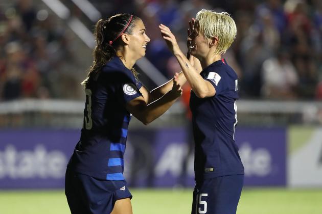 CARY, NC - OCTOBER 04:  Alex Morgan #13 and Megan Rapinoe #15 of USA celebrate after a goal against Mexico during the Group A - CONCACAF Women's Championship at WakeMed Soccer Park on October 4, 2018 in Cary, North Carolina.  (Photo by Streeter Lecka/Getty Images)