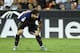 Barcelona's Argentinian forward Lionel Messi bends over during the Spanish league football match between Valencia CF and FC Barcelona at the Mestalla stadium in Valencia on October 7, 2018. (Photo by JOSE JORDAN / AFP) (Photo credit should read JOSE JORDAN/AFP/Getty Images)