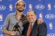 Chicago Bulls center Joakim Noah, left, and coach Tom Thibodeau pose for a photo after Noah was awarded the NBA's Defensive Player of the Year, Monday, April 21, 2014, in Lincolnshire, Ill. (AP Photo/Matt Marton)
