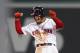 BOSTON, MA - OCTOBER 14: Mookie Betts #50 of the Boston Red Sox celebrates his two-run double during the eighth inning against the Houston Astros in Game Two of the American League Championship Series at Fenway Park on October 14, 2018 in Boston, Massachusetts. (Photo by Maddie Meyer/Getty Images)