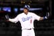 LOS ANGELES, CA - OCTOBER 15: Manny Machado #8 of the Los Angeles Dodgers reacts after hitting a double during the ninth inning against the Milwaukee Brewers in Game Three of the National League Championship Series at Dodger Stadium on October 15, 2018 in Los Angeles, California. (Photo by Harry How/Getty Images)