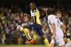 TOPSHOT - Olympic sprinter Usain Bolt (C), playing for A-League football club Central Coast Mariners, shoots on goal against Macarthur South West United in his first competitive start for the club in Sydney on October 12, 2018. (Photo by PETER PARKS / AFP) / -- IMAGE RESTRICTED TO EDITORIAL USE - STRICTLY NO COMMERCIAL USE -- (Photo credit should read PETER PARKS/AFP/Getty Images)