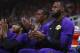 LeBron James of the Los Angeles Lakers, right, applauds during the first half of the NBA basketball pre-season game against the Golden State Warriors on Friday, October 12, 2018, in San Jose, California. (AP Photo / Ben Margot)