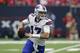 HOUSTON, TX - OCTOBER 14: Josh Allen #17 of the Buffalo Bills rolls out in the first quarter against the Houston Texans at NRG Stadium on October 14, 2018 in Houston, Texas. (Photo by Tim Warner/Getty Images)