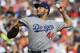 Los Angeles Dodgers starting pitcher Rich Hill (44) delivers during the first inning in Game 4 of baseball's National League Division Series against the Atlanta Braves, Monday, Oct. 8, 2018, in Atlanta. (AP Photo/John Amis)