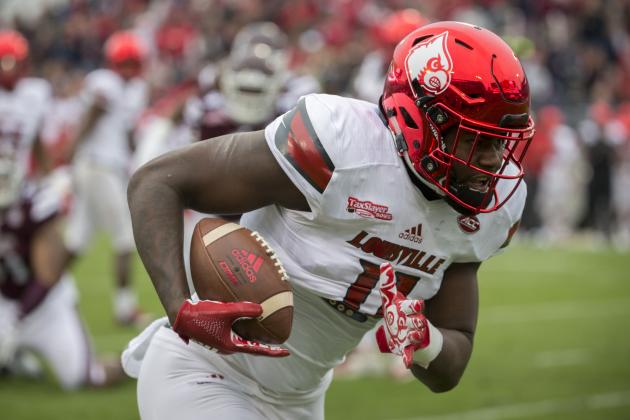 Louisville tight end Kemari Averett (11) runs down the sideline with the ball during the first half of the TaxSlayer Bowl NCAA college football game against Mississippi State, Saturday, Dec. 30, 2017, in Jacksonville, Fla. (AP Photo/Stephen B. Morton)
