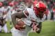 Louisville tight end Kemari Averett (11) runs down the sideline with the ball during the first half of the TaxSlayer Bowl NCAA college football game against Mississippi State, Saturday, Dec. 30, 2017, in Jacksonville, Fla. (AP Photo/Stephen B. Morton)
