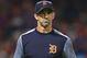 Detroit Tigers manager Brad Ausmus walks to the dugout after a pitching charge in the seventh inning of a baseball game against the Cleveland Indians, Sunday, July 9, 2017, in Cleveland. The Tigers won 5-3. (AP Photo/David Dermer)