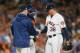 HOUSTON, TX - OCTOBER 16: Joe Smith #38 of the Houston Astros is pulled by manager AJ Hinch in the sixth inning against the Boston Red Sox during Game Three of the American League Championship Series at Minute Maid Park on October 16, 2018 in Houston, Texas. (Photo by Bob Levey/Getty Images)