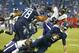 Tennessee Titans quarterback Marcus Mariota (8) is sacked by Baltimore Ravens linebacker Patrick Onwuasor for a 7-yard loss in the second half of an NFL football game Sunday, Oct. 14, 2018, in Nashville, Tenn. (AP Photo/Wade Payne)