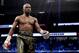 LAS VEGAS, NV - AUGUST 26: Floyd Mayweather Jr. walks to his corner while taking on Conor McGregor during their super welterweight boxing match on August 26, 2017 at T-Mobile Arena in Las Vegas, Nevada. (Photo by Christian Petersen/Getty Images)