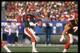 25 Sep 1988: Quarterback Boomer Esiason of the Cincinnati Bengals looks to throw the ball during a game against the Cleveland Browns at Riverfront Stadium in Cincinnati, Ohio. The Browns won the game, 23-16.