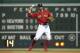 Boston Red Sox's Mookie Betts tosses the ball around the horn as he plays second base in a baseball game against the New York Yankees at Fenway Park, Friday, Aug. 3, 2018, in Boston. (AP Photo/Elise Amendola)