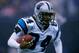 9 Nov 1997: Wide receiver Rae Carruth of the Carolina Panthers moves the ball during a game against the Denver Broncos at Mile High Stadium in Denver, Colorado. The Broncos won the game, 34-0. Mandatory Credit: Brian Bahr /Allsport