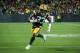 GREEN BAY, WI - OCTOBER 15: Aaron Jones #33 of the Green Bay Packers runs with the ball in the first quarter against the San Francisco 49ers at Lambeau Field on October 15, 2018 in Green Bay, Wisconsin. (Photo by Dylan Buell/Getty Images)