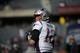 New England Patriots quarterback Tom Brady (12) warms up before an NFL football game Sunday, Oct. 21, 2018, in Chicago. (AP Photo/David Banks)