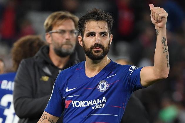Chelsea's Spanish midfielder Cesc Fabregas applauds the fans following the English League Cup third round football match between Liverpool and Chelsea at Anfield in Liverpool, north west England on September 26, 2018. (Photo by Paul ELLIS / AFP) / RESTRICTED TO EDITORIAL USE. No use with unauthorized audio, video, data, fixture lists, club/league logos or 'live' services. Online in-match use limited to 120 images. An additional 40 images may be used in extra time. No video emulation. Social media in-match use limited to 120 images. An additional 40 images may be used in extra time. No use in betting publications, games or single club/league/player publications. / (Photo credit should read PAUL ELLIS/AFP/Getty Images)
