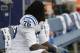 Indianapolis Colts defensive end Chris McCain sits on the bench before an NFL football preseason game against the Seattle Seahawks, Thursday, Aug. 9, 2018, in Seattle. (AP Photo/Stephen Brashear)