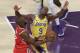 Los Angeles Lakers' Rajon Rondo (9) defends on Houston Rockets' Chris Paul during the first half of an NBA basketball game Saturday, Oct. 20, 2018, in Los Angeles. (AP Photo/Marcio Jose Sanchez)