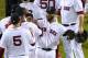 Boston Red Sox's Eduardo Nunez, right, celebrates after defeating the Los Angeles Dodgers 8-4 in of Game 1 of the World Series baseball game Tuesday, Oct. 23, 2018, in Boston. (AP Photo/Elise Amendola