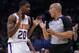 Phoenix Suns forward Josh Jackson (20) argues a call with referee Jacyn Goble during the third quarter of an NBA basketball game against the Denver Nuggets, Saturday, Oct. 20, 2018, in Denver. (AP Photo/Jack Dempsey)