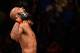 KANSAS CITY, MO - APRIL 15: Demetrious Johnson celebrates his submission victory over Wilson Reis of Brazil in their UFC flyweight fight during the UFC Fight Night event at Sprint Center on April 15, 2017 in Kansas City, Missouri. (Photo by Josh Hedges/Zuffa LLC/Zuffa LLC via Getty Images)