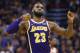 Los Angeles Lakers forward LeBron James (23) celebrates a basket against the Phoenix Suns during the second half of an NBA basketball game, Wednesday, Oct. 24, 2018, in Phoenix. (AP Photo/Matt York)