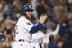 LOS ANGELES, CA - OCTOBER 26: Max Muncy #13 of the Los Angeles Dodgers celebrates his thirteenth inning run against the Boston Red Sox in Game Three of the 2018 World Series at Dodger Stadium on October 26, 2018 in Los Angeles, California. (Photo by Ezra Shaw/Getty Images)