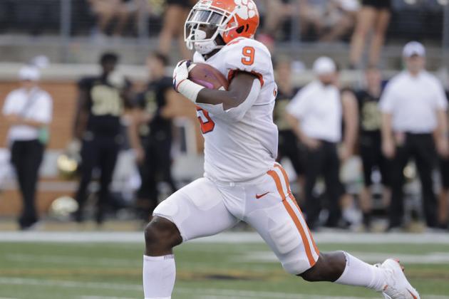 Clemson's Travis Etienne (9) runs for a touchdown against Wake Forest during the first half of an NCAA college football game in Charlotte, N.C., Saturday, Oct. 6, 2018. (AP Photo/Chuck Burton)
