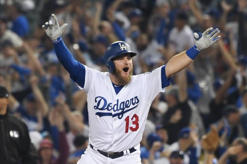LOS ANGELES, CA - OCTOBER 26: Max Muncy #13 of the Los Angeles Dodgers celebrates his eighteenth inning walk-off home run to defeat the the Boston Red Sox 3-2 in Game Three of the 2018 World Series at Dodger Stadium on October 26, 2018 in Los Angeles, California. (Photo by Harry How/Getty Images)