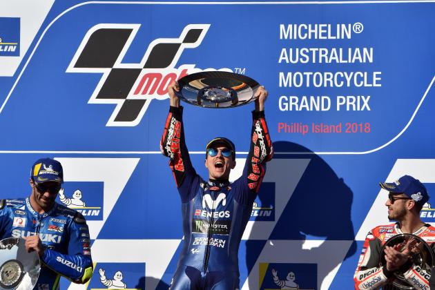 Winner Movistar Yamaha MotoGP's Spanish rider Maverick Vinales celebrates with Team Suzuki Ecstar's Italian rider Andrea Iannone (L), second, and Ducati Team's Italian rider Andrea Dovizioso, third, on the podium of the MotoGP Australian Grand Prix at Phillip Island on October 28, 2018. (Photo by PAUL CROCK / AFP) / -- IMAGE RESTRICTED TO EDITORIAL USE - STRICTLY NO COMMERCIAL USE --        (Photo credit should read PAUL CROCK/AFP/Getty Images)