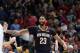 New Orleans Pelicans forward Anthony Davis (23) celebrates after they defeated the Brooklyn Nets by two points in an NBA basketball game in New Orleans, Friday, Oct. 26, 2018. The Pelicans won 117-115. (AP Photo/Gerald Herbert)